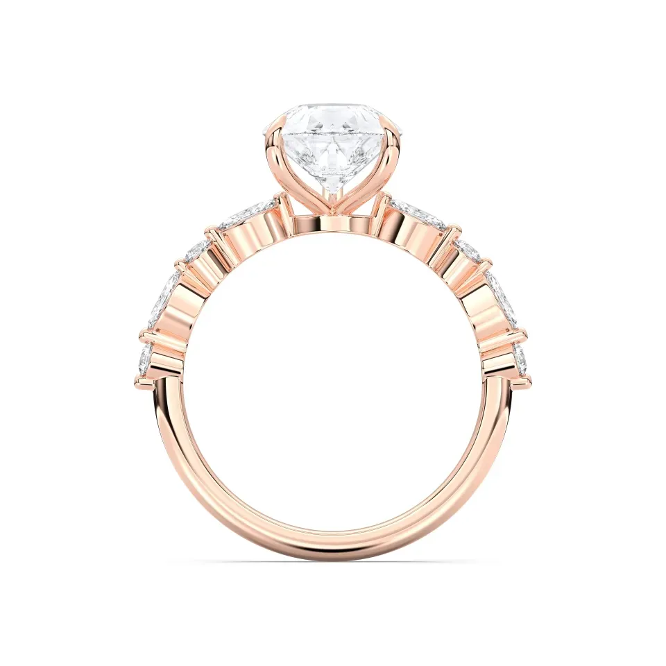 Rose gold Pear Cut Engagement Ring With Mq/rd Side Stone
