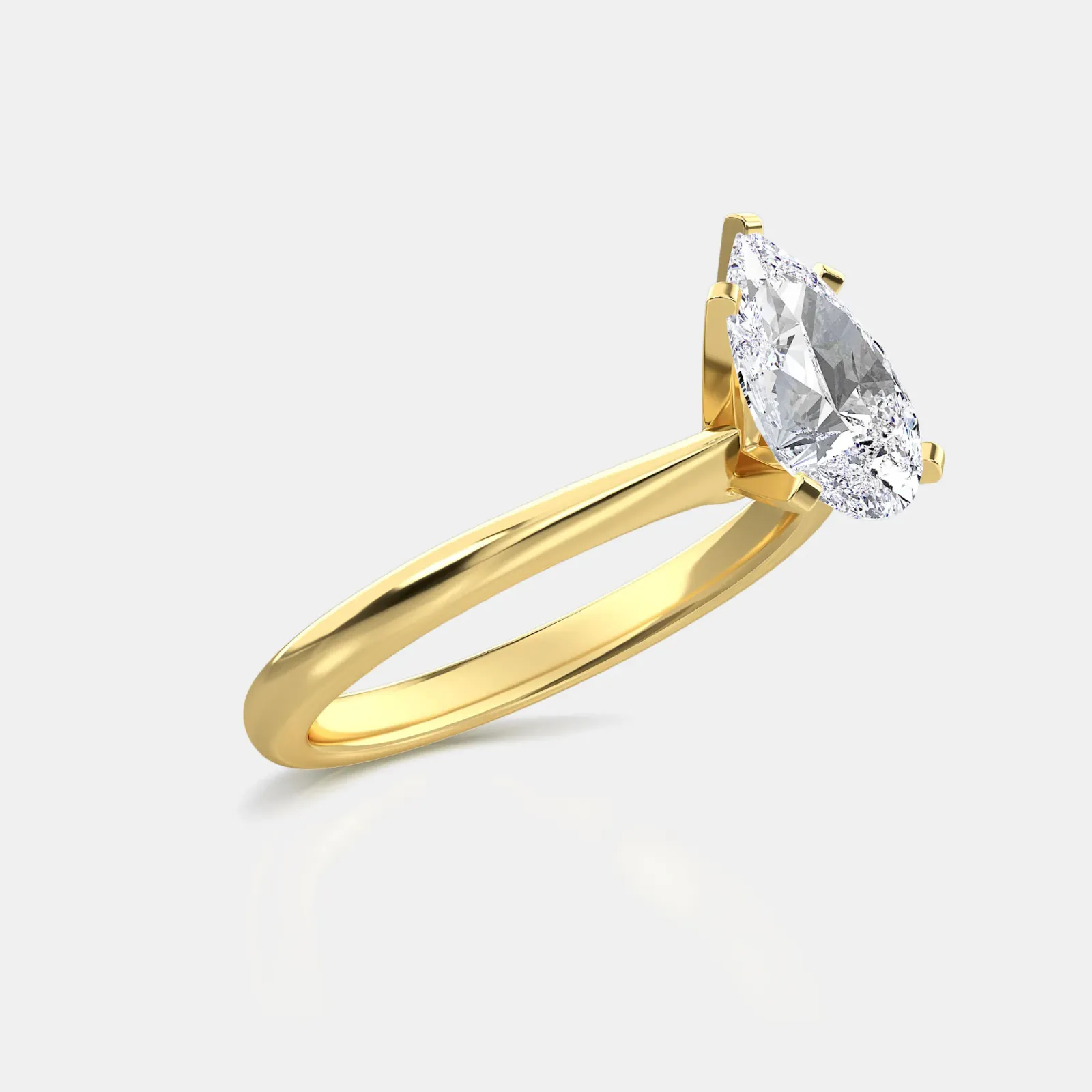 Yellow gold Pear Cut Solitaire Ring