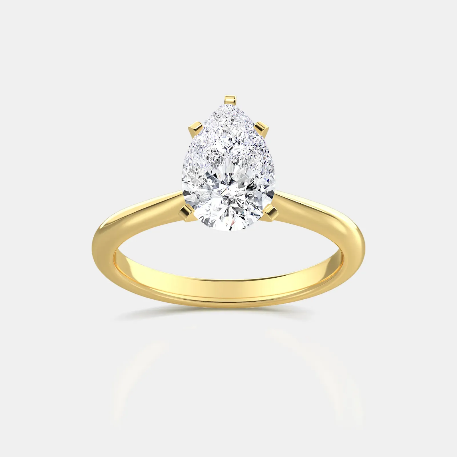 Yellow gold Pear Cut Solitaire Ring