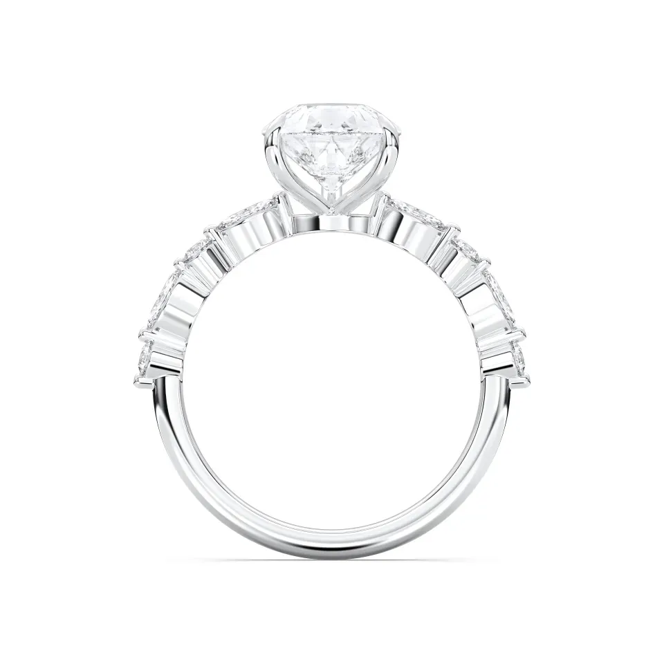 White gold Pear Cut Engagement Ring With Mq/rd Side Stone