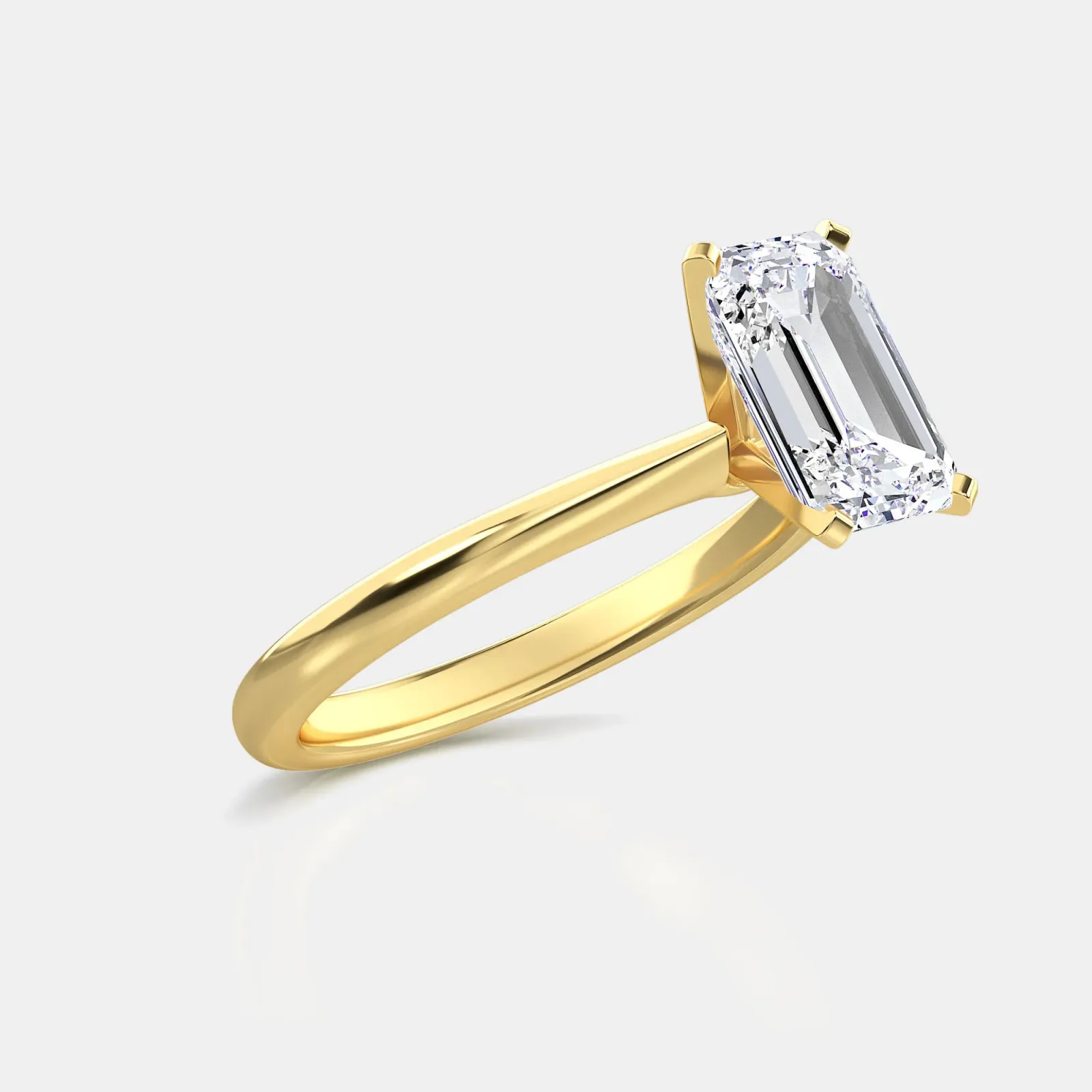 Yellow gold Emerald Cut Solitaire Ring