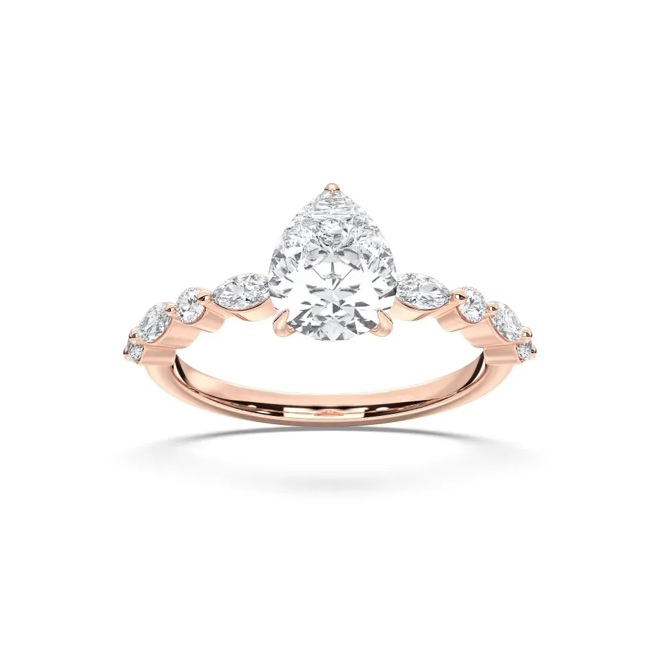 Rose gold Pear Cut Engagement Ring With Mq/rd Side Stone