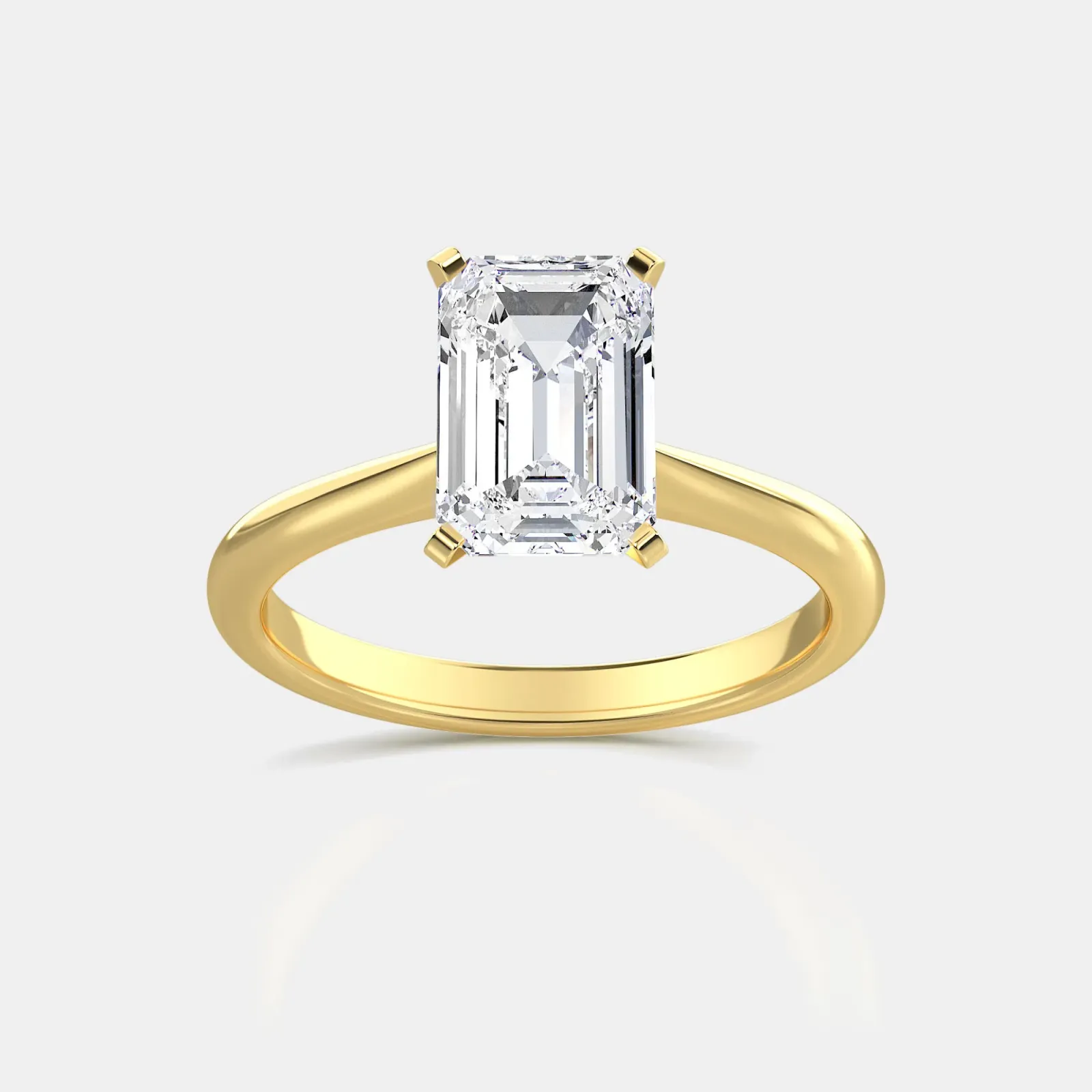 Yellow gold Emerald Cut Solitaire Ring
