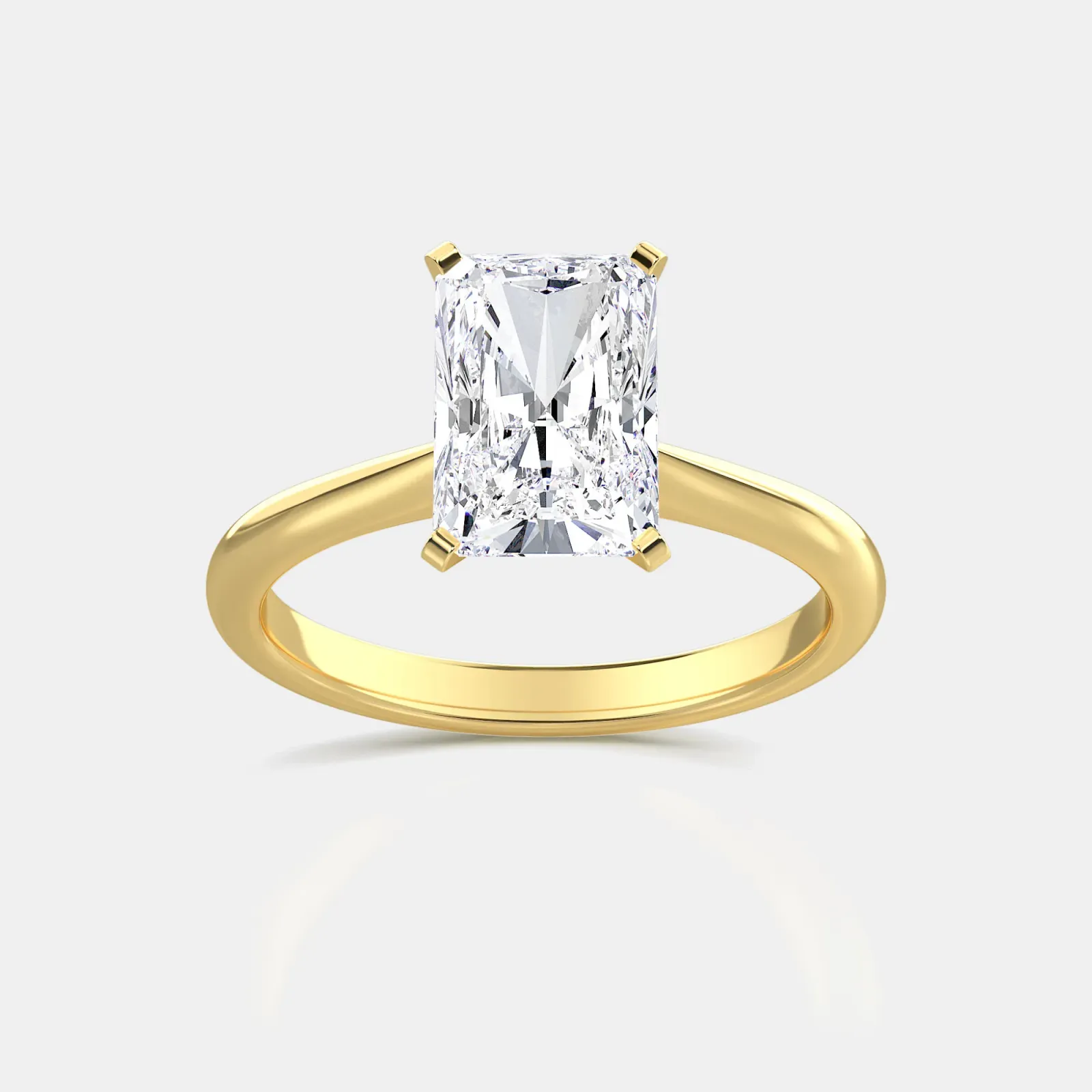 Yellow gold Radiant Cut Solitaire Ring